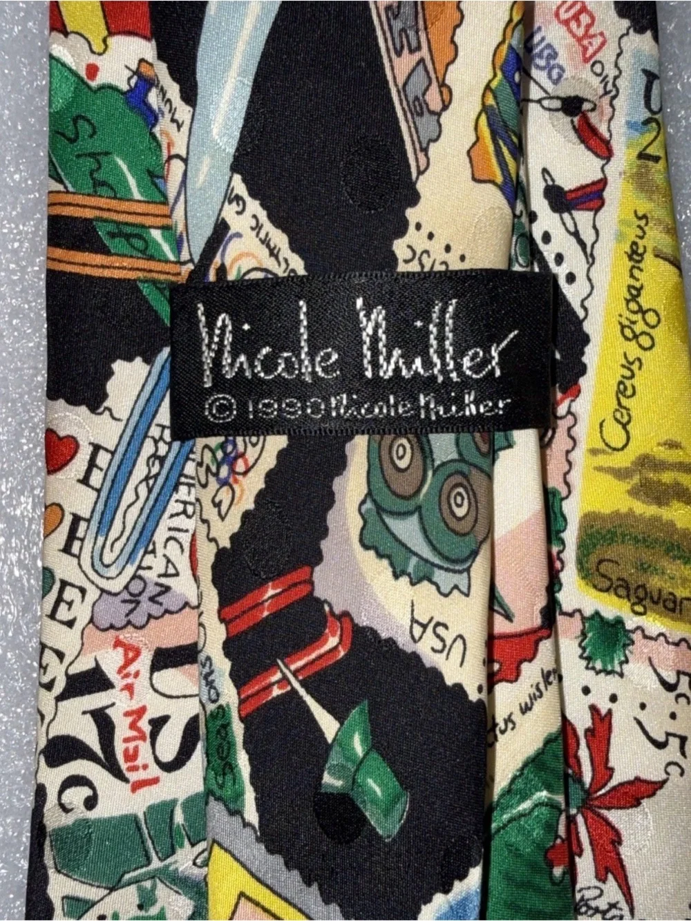 Nicole Miller tie throughout prints